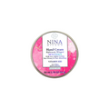 Nina Milano hand cream container on a beige background